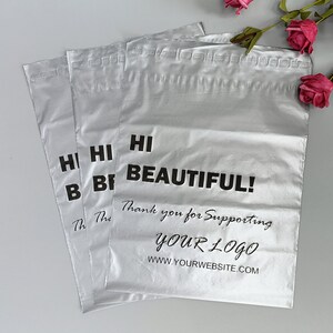 May include: Three white poly mailers with black text. The text reads "Hi Beautiful! Thank you for Supporting YOUR LOGO WWW.YOURWEBSITE.COM".