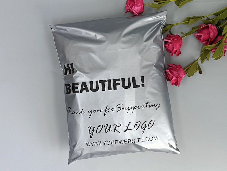 May include: Silver poly mailer with the text "Hi Beautiful! Thank you for supporting YOUR LOGO www.yourwebsite.com" printed in black.
