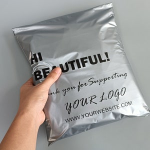 May include: Silver poly mailer with black text that reads "Hi Beautiful! Thank you for supporting YOUR LOGO www.yourwebsite.com"