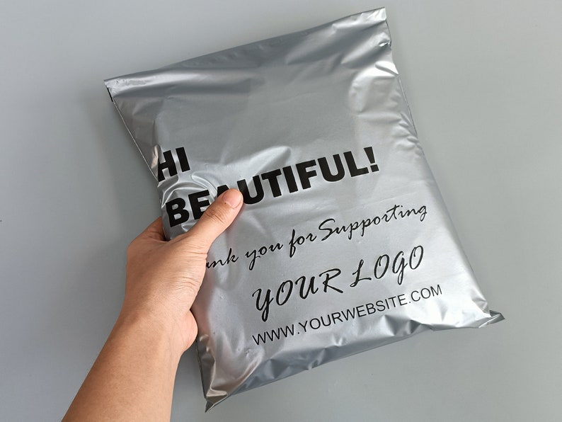 May include: Silver poly mailer with black text that reads "Hi Beautiful! Thank you for supporting YOUR LOGO www.yourwebsite.com"