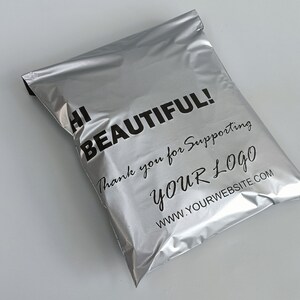 May include: Silver mailing envelope with the text "Hi Beautiful! Thank you for supporting YOUR LOGO www.yourwebsite.com"