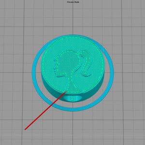 May include: A teal blue 3D printed pendant featuring a silhouette of a woman with a ponytail. The pendant is surrounded by a teal blue ring.
