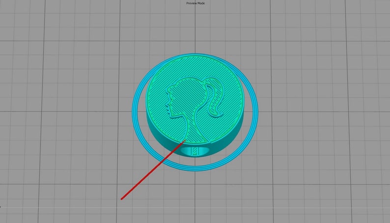May include: A teal blue 3D printed pendant featuring a silhouette of a woman with a ponytail. The pendant is surrounded by a teal blue ring.