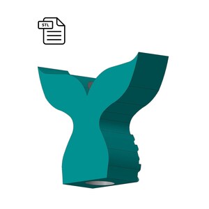 May include: Teal blue 3D printed mermaid tail fin. The fin is designed with a textured surface and a rounded tip.