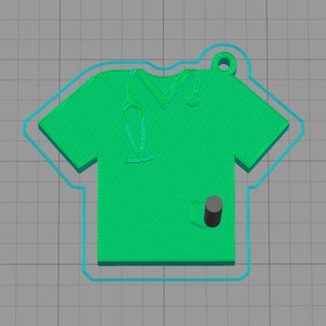 May include: Green scrub top keyring with a stethoscope and pocket. The keyring is made of plastic and has a hole for attaching to a key ring.