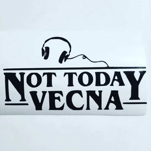 May include: Black and white vinyl sticker with the text "NOT TODAY VECNA" and a pair of headphones with a cord.