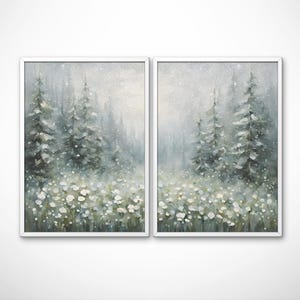 May include: A set of two framed watercolor paintings depicting a snowy forest scene with tall evergreen trees and a field of white flowers. The paintings are in a muted green and white color palette.