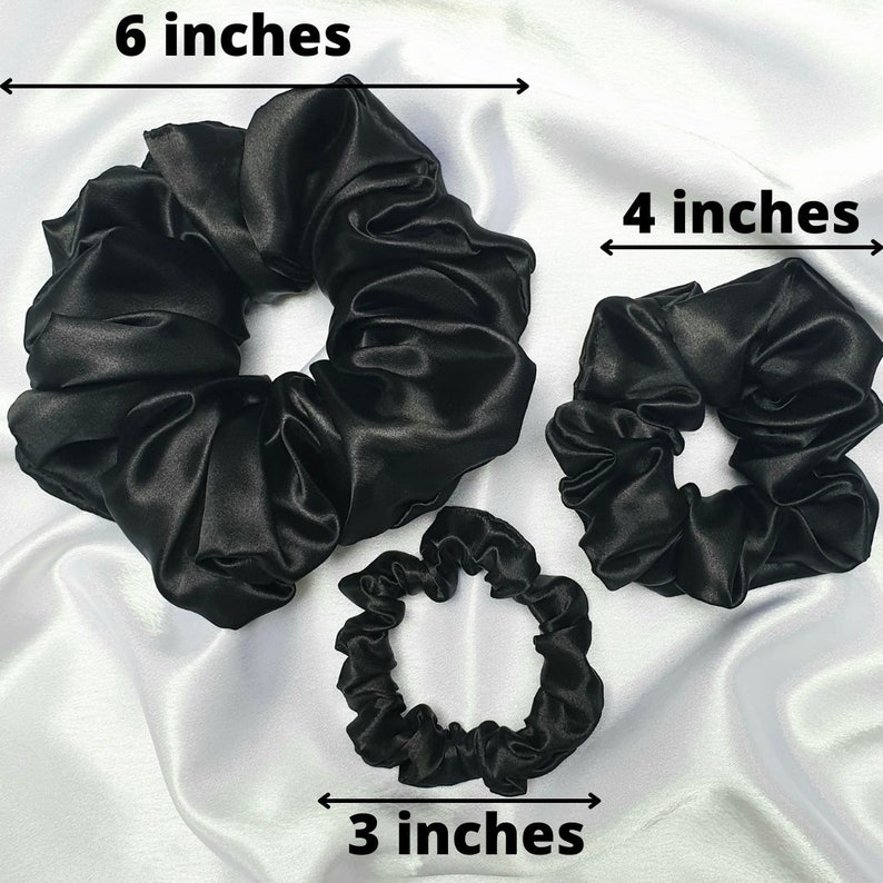 Black silky satin hair scrunchie approx sizes:
XL is 6 inches in diameter,
Medium is 4 inches in diameter
Skinny is 3 inches in diameter.