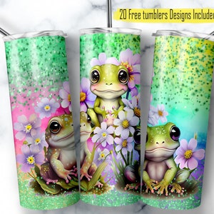 May include: Three stainless steel tumblers with a green, pink, and blue glitter background. Each tumbler features a cartoon frog with large eyes and a floral design. The text "20 Free Tumblers Designs Included" is at the top of the image.