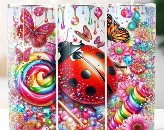 Könnte beinhalten: Drei Edelstahlbecher mit farbenfrohen Designs. Die Designs zeigen einen Marienkäfer, Schmetterlinge, einen Regenbogen-Lutscher und glitzernde Edelsteine. Der Text "20 FREE TUMBLERS DESIGNS INCLUDED" steht oben.