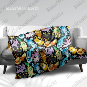 May include: A soft, plush throw blanket featuring a colorful pattern of various Pokemon characters on a black background. The blanket is made of a soft, comfortable material and is perfect for snuggling up on the couch.