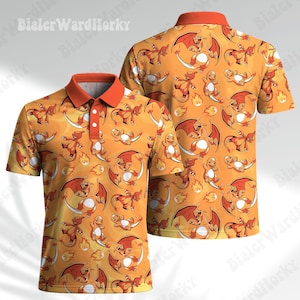 May include: An orange polo shirt featuring an all-over repeating pattern of cartoon dragon-like creatures and small flames. The shirt has a solid orange collar, a two-button placket with white buttons, and short sleeves. The design is vibrant and graphic.