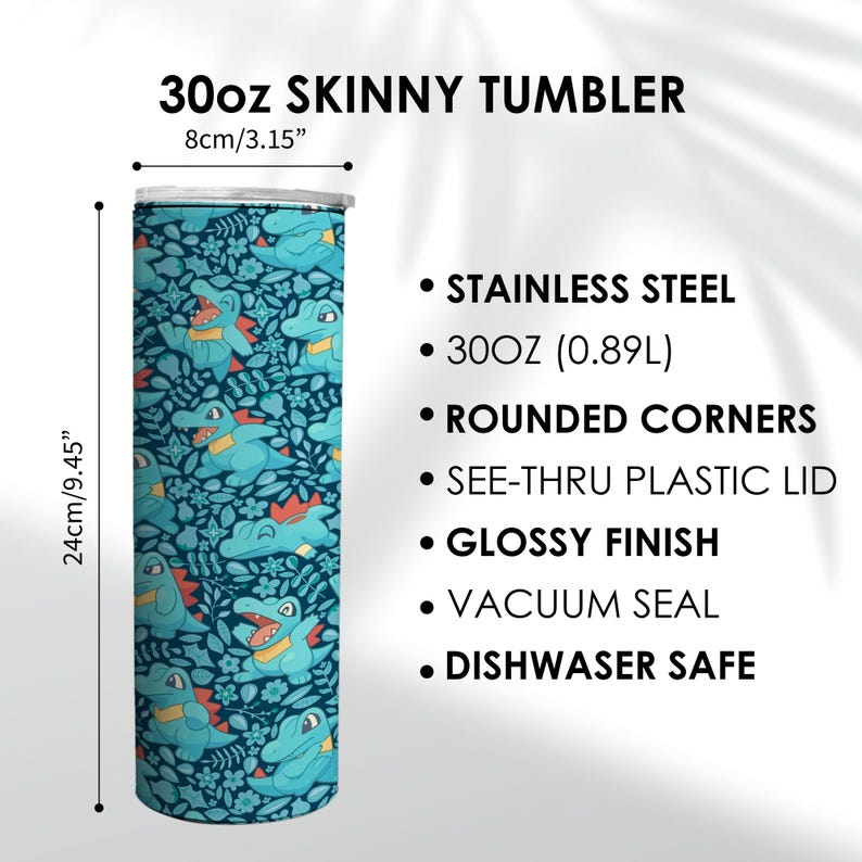 May include: A 30oz skinny tumbler with a blue and teal cartoon design. The stainless steel tumbler is 24cm tall and 8cm wide, with a glossy finish and a see-thru plastic lid. It is dishwasher safe.