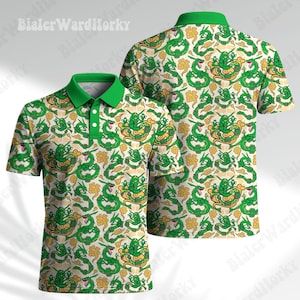 May include: A short-sleeved polo shirt with a green collar and a repeating pattern of green serpentine creatures and yellow cloud-like shapes on a white background. The shirt features a three-button placket and is shown from both front and back views.