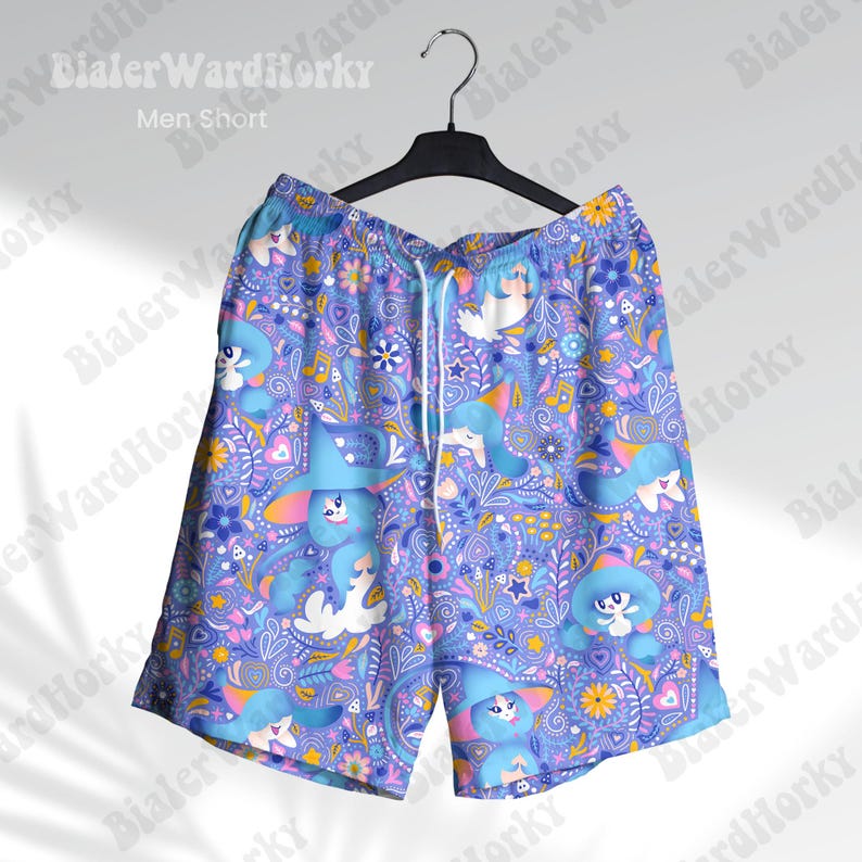May include: Blue shorts with a whimsical pattern featuring cartoon characters, stars, and musical notes. The shorts have a drawstring waist and are hanging on a black hanger. The text "Men Short" is visible.