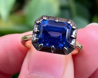 エメラルド　ロンドンブルートパーズ エメラルドカット ロンドンブルートパーズ リング：トリオアクセント