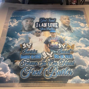 May include: A memorial blanket with four portraits set against a cloudy sky. Text includes "God Said I LAN LOVE You Better", "Sunrise August 16, 1960", "Sunset Oct 18, 2025", "Forever In Our Heart", and "Fred Butler".
