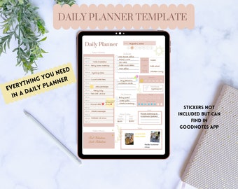 May include: A digital tablet displaying a daily planner template with sections for a schedule, to-do list, meal tracking, and notes. The interface features soft pink and neutral tones with text labels. A stylus rests beside the tablet on a surface.