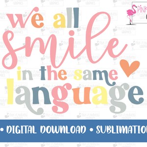 May include: A colorful graphic design with the text "We all smile in the same language" in a variety of colors, including pink, yellow, blue, and orange. A small pink heart is included in the design.