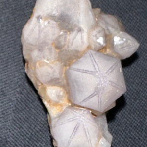 Amethyst light purple with unique star shape lines.