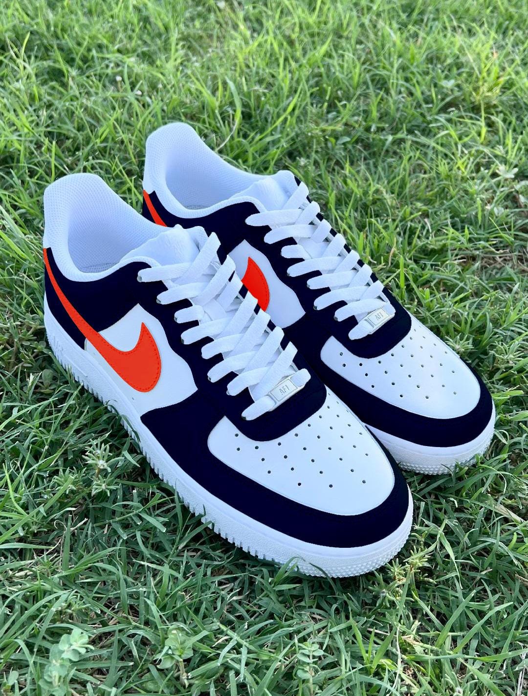 navy and orange sneakers