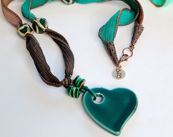 Unique necklace made of Handmade Glazed ceramic heart pendant, Ceramic beads, hand-dyed silk ribbon, leather cord, boho, one of a kind, rare