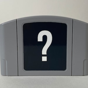 Custom, ONE-OF-A-KIND N64 - Mystery Nintendo 64 Parody Video Game Cartridge With Mystery Game and Stand