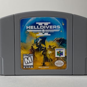 May include: A gray Nintendo 64 game cartridge for the game Helldivers II. The game is rated M for Mature by the ESRB. The cartridge has a model number of 02082024.