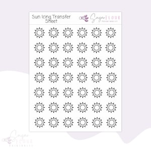 May include: A sheet of 36 sun-shaped icing transfers. The sheet is white with black outlines of the suns. The text "Sun Icing Transfer Sheet" is at the top of the sheet.