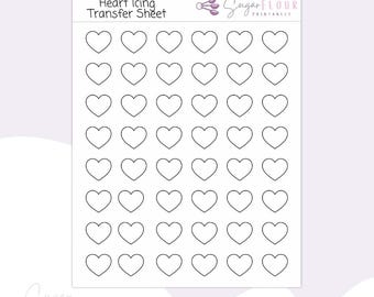 May include: A printable sheet with 49 heart outlines for use with icing transfer sheets. The sheet is titled "Heart Icing Transfer Sheet" and has the text "Sugar Flour Printables" in the top right corner.