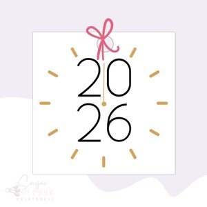 May include: A white square card with a pink bow at the top. The card has a clock face with gold tick marks and the numbers 20 and 26 in black.