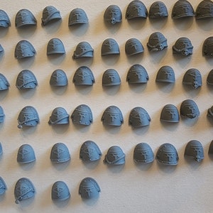 Sons of the Warmaster shoulder pads