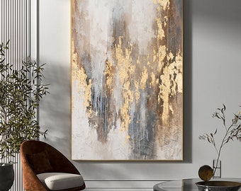 May include: Abstract painting with gold, brown, and grey tones. The painting has a textured look and is framed in a gold frame.