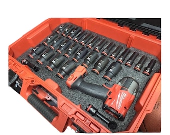 May include: A red tool case with a black impact driver and a variety of black sockets. The sockets are labeled with their sizes in inches.