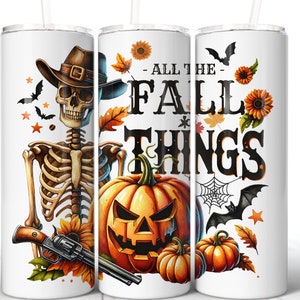 May include: Three white tumblers with a fall theme. The left tumbler features a skeleton wearing a cowboy hat and holding a gun. The middle tumbler features a pumpkin with a jack-o-lantern face and the text "All the Fall Things". The right tumbler features a pumpkin, bats, and sunflowers.