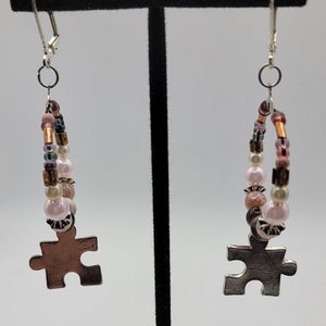 Pink and grey puzzle piece hoop beaded earrings