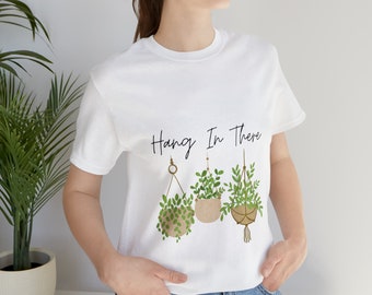 Cuelga ahí camiseta