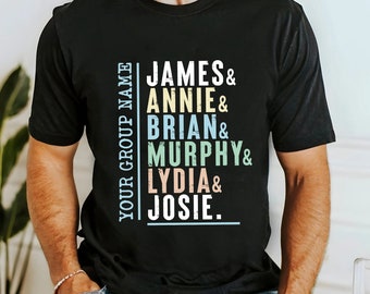 May include: Black t-shirt with a vertical list of names in colourful text. The text reads "YOUR GROUP NAME JAMES & ANNIE & BRIAN & MURPHY & LYDIA & JOSIE."