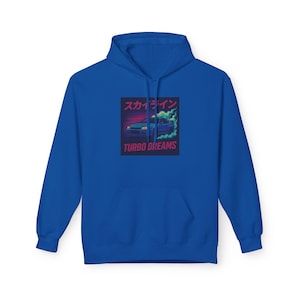 May include: Royal blue hoodie with a front graphic. The graphic features a blue car with the text "スカイライン" and "TURBO DREAMS" in a retro style. The hoodie has a kangaroo pocket and a drawstring hood.