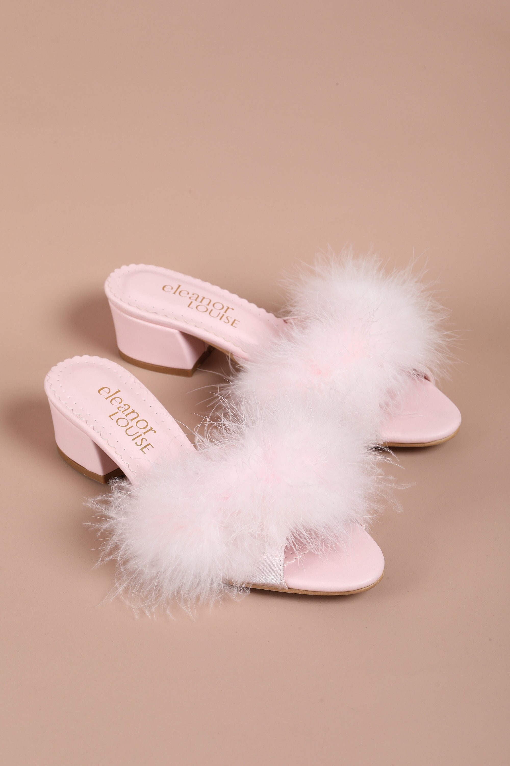 Marabou and monograms: Louis Vuitton launches slipper collection