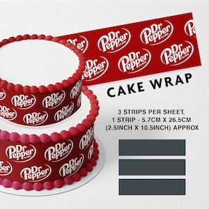 May include: A two-tiered cake decorated with red and pink frosting and a Dr Pepper logo cake wrap. The cake wrap has three strips per sheet, each measuring 5.7 cm by 26.5 cm (2.5 inches by 10.5 inches).