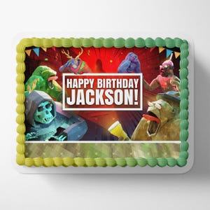 May include: Rectangular birthday cake with green and yellow frosting trim. The cake features a red background with cartoon characters and the text "HAPPY BIRTHDAY JACKSON!" in a white box. The cake is decorated with various cartoon characters.