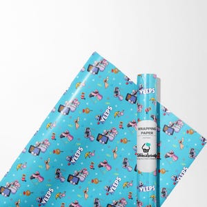 May include: Blue wrapping paper with a repeating pattern of cartoon characters, phones, and the word "YEEPS". A roll of the same paper is visible, with the text "WRAPPING PAPER" and a logo.