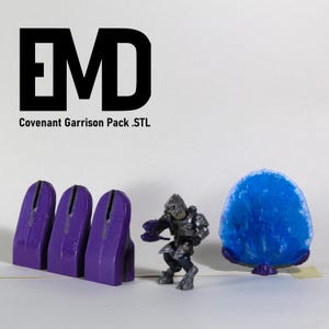 May include: A collection of 3D-printed miniatures and props. The image features three purple, stylized structures, a detailed silver and black figure, and a blue, egg-shaped object. Text at the top reads "EMD" and "Covenant Garrison Pack .STL" below.