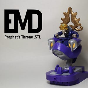 May include: A purple and silver Prophet's Throne .STL model with a gold crown and a figure seated within. The model has a futuristic design with a base and a central support. The text "EMD" and "Prophet's Throne .STL" are displayed in black.