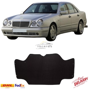 Könnte beinhalten: Silberne Limousine mit schwarzer Unterbodenverkleidung. Das Auto hat einen Frontgrill, Scheinwerfer und ein Logo mit der Aufschrift "HLS CAR PARTS". Das Bild enthält auch Logos für DHL, FedEx und "Fast Delivery".