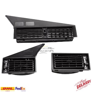 以下が含まれることがあります： 黒い車のエアベントコンポーネントが3つ。 ベントには調整可能なルーバーがあり、長方形または台形です。 画像には、DHL、FedExのロゴと「Fast Delivery」のグラフィックが含まれています。