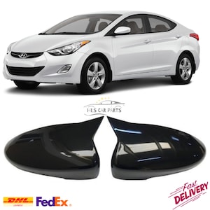 May include: A pair of black side view mirrors for a Hyundai Elantra. The mirrors are made of plastic and have a smooth, glossy finish.