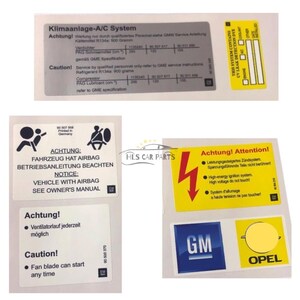 Pode incluir: Um conjunto de autocolantes de aviso e informa&ccedil;&atilde;o para autom&oacute;veis. Os autocolantes incluem texto em alem&atilde;o e ingl&ecirc;s, com avisos sobre airbags, alta tens&atilde;o e sistemas de ar condicionado. Os autocolantes tamb&eacute;m apresentam os logotipos da GM e da Opel.