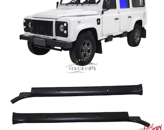 May include: A white Land Rover Defender SUV with black tires and trim. Below are two black door trim pieces. The image includes the text "HLS CAR PARTS".